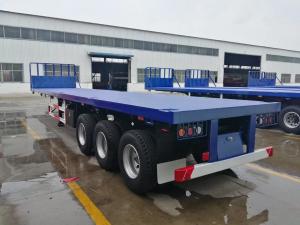 China 40 Feet 60 Ton Used Tri Axle Flatbed Semi Trailers For Sale wholesale