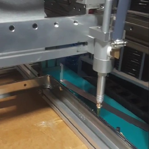 Automated Glue Dispensing Robot 0.4Mpa - 0.6Mpa Glue Dispensers For Ceramic Hob Frame Sealing