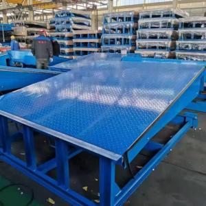 China Logistic Park High Volume Hydraulic Driving Loading Dock Leveler Heavy Duty Steel Aluminium Bumper Fixed Truck Dock wholesale