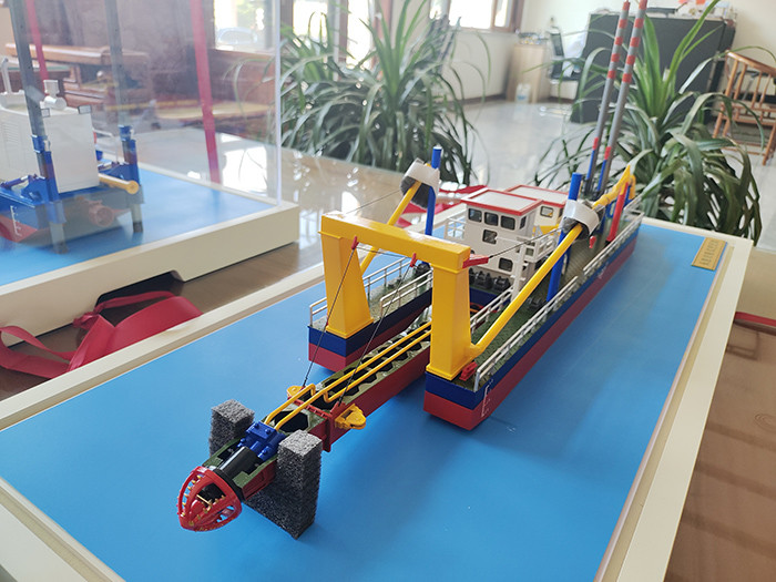 The design length of the mud dredging boat which with a red color is 20 meters